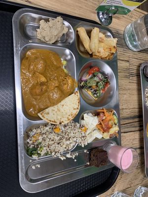 A mix of curry, lasagne, pizza, spring rolls, masala mash, salad and desert!   at Vegie Tribe in Melbourne