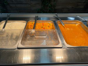 White rice, paella and butter chicken  at Vegie Tribe in Melbourne