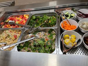 Pasta salad, quinoa salad, fruit salad and spinach and pumpkin salad with various toppings.  at Vegie Tribe in Melbourne
