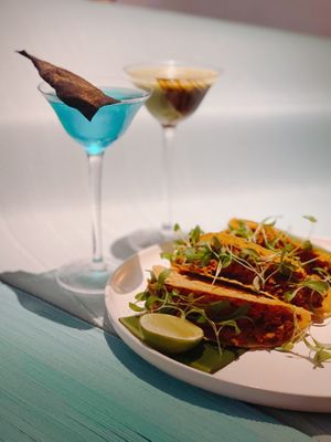 Spirulina cocktail (blue), carob cocktail, jackfruit tacos at Analogue Initiative in Central Singapore