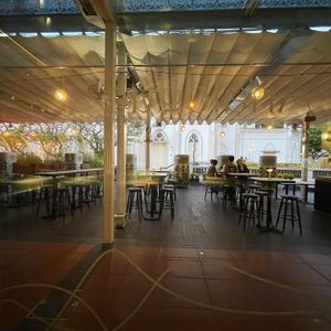 Outdoor seating at Analogue Initiative in Central Singapore