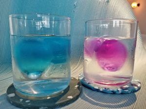 Plain water in colourful glasses at Analogue Initiative in Central Singapore