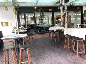 Outside seating  at Analogue Initiative in Central Singapore