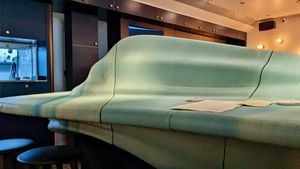 Indoor seating with 3D-printed oceanic island bar top using 1600 kg of recycled plastic at Analogue Initiative in Central Singapore