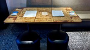 Indoor seating with tables locally made using mushrooms / mycelium at Analogue Initiative in Central Singapore