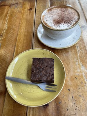 Brownie and cappuccino with soy milk at Esquires Coffee in Bournemouth