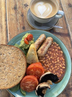 vegan sausage and beans, cappuccino with oat milk  at Esquires Coffee in Bournemouth