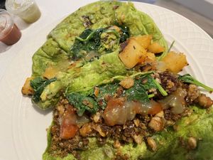 Breakfast tacos — look a little rough after delivery, but taste is on point!!  at Revolucion Coffee + Juice RIM in San Antonio