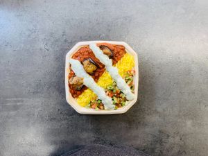 Gheyme Bademjoon. Saffron rice. Stew with base of tomato sauce simmered in saffron, turmeric, dried lime and cinnamon with yellow split peas  at KUKU in Copenhagen