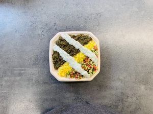 Ghorme Sabzi - The National Dish! Herbs simmered in turmeric, dried lime and red kidney beans with slices of brown mushroom served with saffron rice  at KUKU in Copenhagen