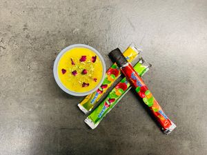 The dessert! Sholezard - rice pudding with rose water, saffron, cinnamon, almonds in slices, pistachio powder and dried rose petals

Plus Lavashak! A sweet and sour fruit bar at KUKU in Copenhagen