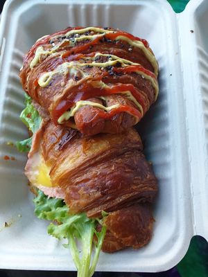 Sausage croissant NZ$10.00, Ham+cheese w/mustard + lettuce croissant NZ$12.00 at Maison des Lys Pâtisserie in Auckland