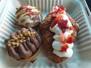 Lemon meringue tart NZ$8.00, Salted caramel chocolate NZ$8.50, Strawberry cream croissant NZ$9.00 at Maison des Lys Pâtisserie in Auckland