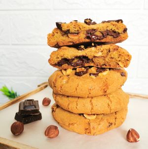 Vegan jumbo chocolate chunk cookies with hazelnuts and chocolate chunks. at Mudita in Auckland