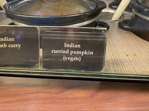 Clearly labelled dishes and specials at Singh's Cafe Kabab Curry in Guam