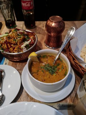 Lentil soup with Papadum and vegetable biryani (background) at Indian Jewel in Prague