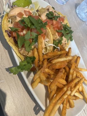 Fysh tacos with seasoned fries  at Loving Hut - Mira Mesa in San Diego