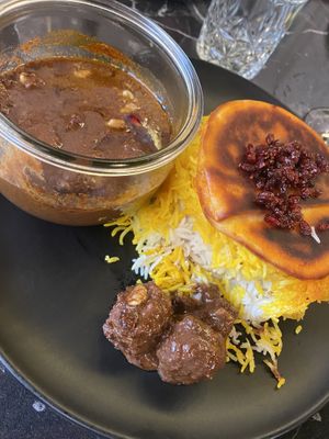 Vegan meat balls in Tamarind-Walnut Sauce, Safran Rice, Rice cake  at Shekamu in Nuremberg
