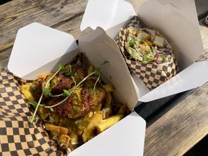 Dirty fries with fritters, and wrap with crispy tofu and avocado mayo at Gusto in Newquay