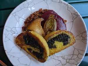 Potato and spinach roulade with lentils at Café Derbl in Hallstatt