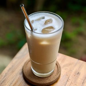 Vegan Iced Oolong Oat Milk Latte at The Plant Food  in Central Singapore