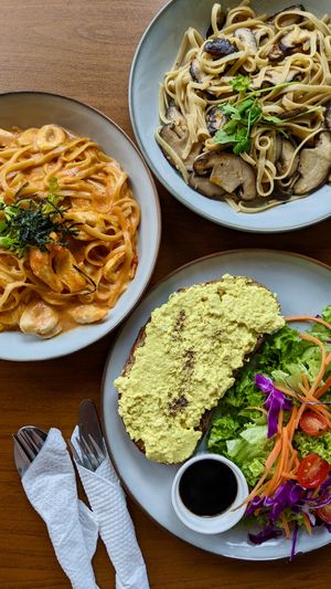 Creamy Vegan Egg Mayo on Rye Sourdough Toast, Creamy Seafood-less Spicy Gochujang Pasta, Mushroom Aglio Olio at The Plant Food  in Central Singapore