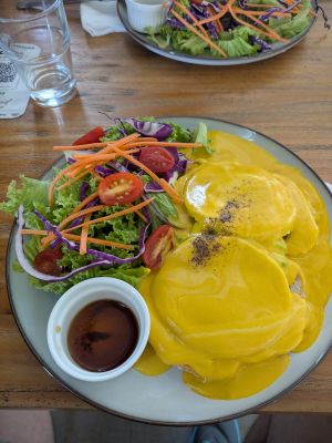 Avocado Benedict on rye sourdough at The Plant Food  in Central Singapore