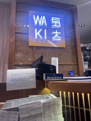 A sign   at WAKI WAKI Veggie Sushi in Bangkok