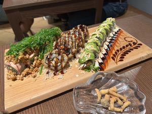 Green Dragon, Black Mushroom Truffle, and another sushi maki. Also, mushroom snacks.  at WAKI WAKI Veggie Sushi in Bangkok