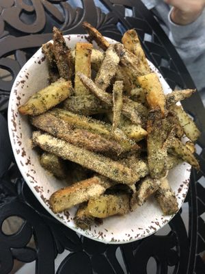 Roasted potato strips with garlic powder, yum yum sauce on the side   at Green Street Eatery in Levittown