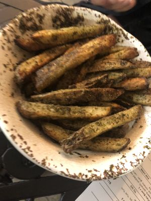Roasted potato strips with garlic powder, yum yum sauce on the side   at Green Street Eatery in Levittown
