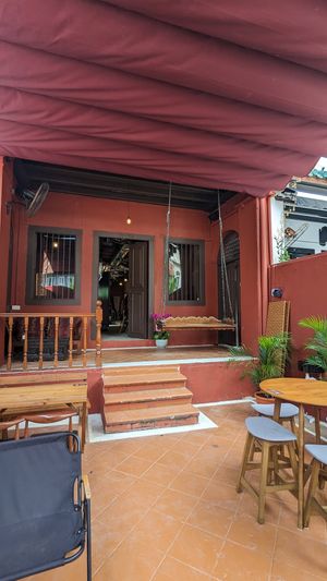 Outdoor seats at Ahimsa Sanctuary in Central Singapore