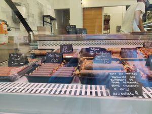 Butifarras, chorizos, morcilla... at Farmers Veggies Butchers in Barcelona