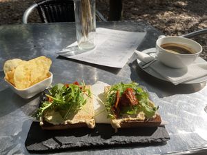 Americano, toast with hummus and sundried tomatoes 🍅   at Casa de Chá  in Coimbra