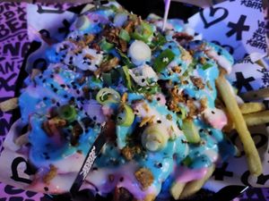 Loaded Fries "iconic rainbow" at Vegan Junk Food Bar - Cologne in Cologne