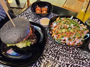 Rainbow fries, burger and betterballen at Vegan Junk Food Bar - Cologne in Cologne