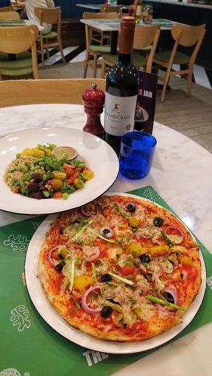Super vegan salad and vegan gardiniera pizza at Pizza Express in Mandaluyong