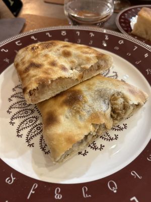 Focaccia ai funghi e focaccia con crema di fagioli  at DedasPuri Ristorante Georgiano & Wine Shop in Pavia