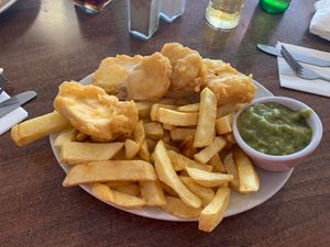 Tofish & chips with side order of mushy peas  at Papa's Fish and Chips in Cleethorpes