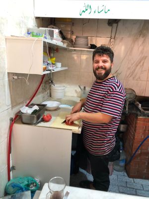 Abu Hamza making salad at Falafel Ammo Hamza in Mardin