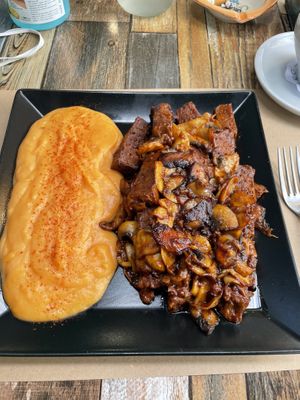 Seitan Steak w/ mushrooms and sweet potatoe purée  at Treis Laloun -Τρεις Λαλούν in Athens