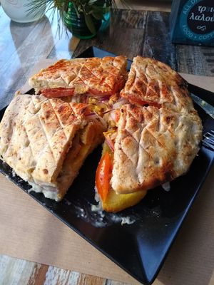 mega meatless yeeros pita (don't remember the exact name), regular size at Treis Laloun -Τρεις Λαλούν in Athens