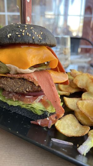 Double cheeseburger with fries  at Treis Laloun -Τρεις Λαλούν in Athens