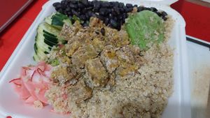 Buddha bowl take away (tomato and lettuce underneath)  at Sanu in Ibarra