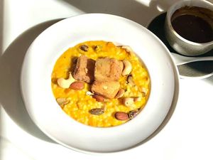 Deep Fried Tofu Pumpkin Sauce and Mixed Nuts Risotto 炸豆腐南瓜濃汁雜果仁意大利飯 (Photo by 素素樂) at Veg-mind Cafe in New Territories