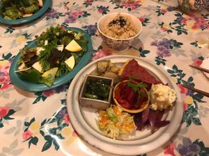 Set with salad, brown rice and small delicious portions of Japanese food. at Le Coccole in Osaka