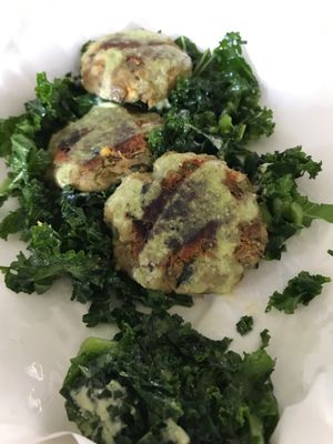 Zucchini and lentil patties with kale at El Buho Vegetariano in San Jose