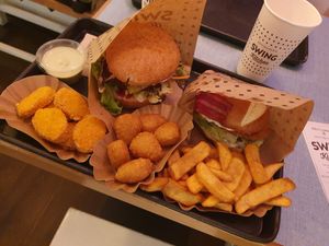 2 burgers nuggets and cheese bites at Swing Kitchen in Innsbruck