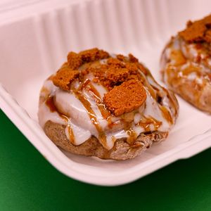 "Cinnamon rolls, glazed and topped with coconut sugar caramel and crunchy cookie bits. at Color Nativo in Puerto Varas