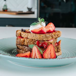 3 slices of artesanal white bread soaked in our special batter and cooked on the grill. Served with strawberry sauce, whipped cream cheese and fresh mint.
 at Color Nativo in Puerto Varas